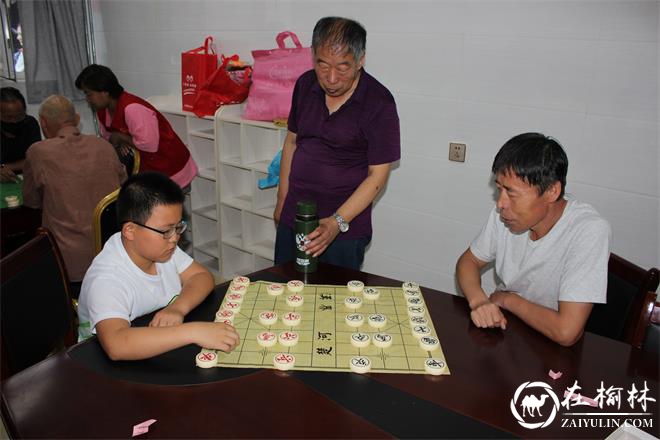 榆阳区新明办灵秀街社区象棋跳棋比赛促邻里和谐