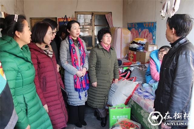 榆神煤电公司为榆阳区兴中路社区特困家庭送温暖