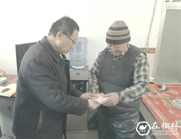 米脂县残联联合市残联开展重度残疾人慰问活动