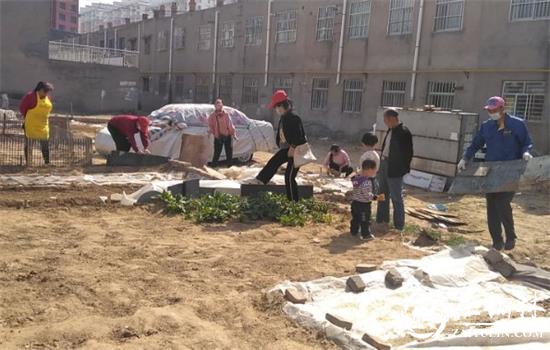 驼峰办兴中路社区深入开展区块化人居环境卫生专项整治活动