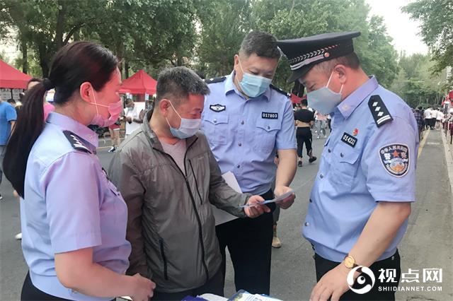 黑龙江哈尔滨市南岗警方深入早晚市开展防范电信网络诈骗宣传