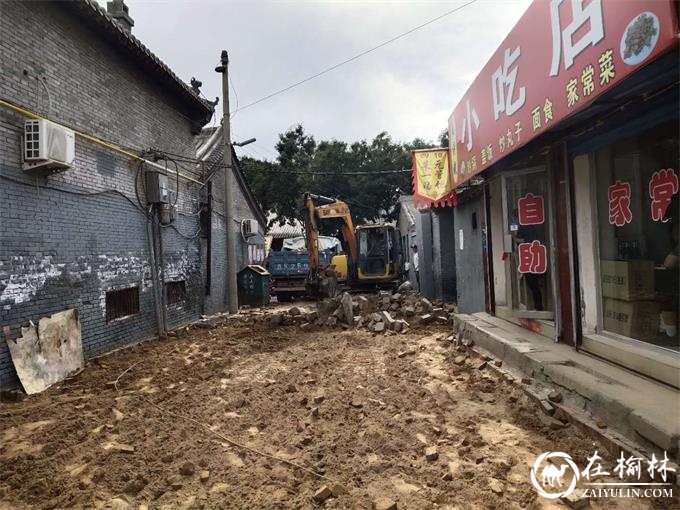 新明楼街道定慧寺社区联合“双报到”单位为民修路