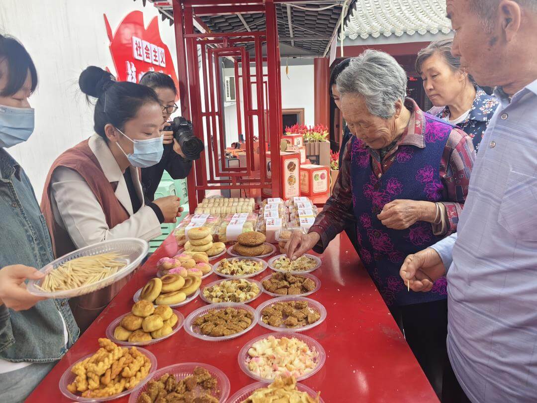 榆阳区新明楼街道定慧寺社区举办老榆林地方特色小吃品鉴会