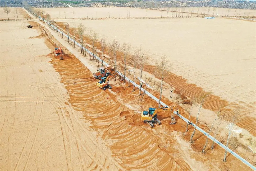 3月29日拍摄的金海村高标准农田项目建设现场（无人机照片）。白万能摄